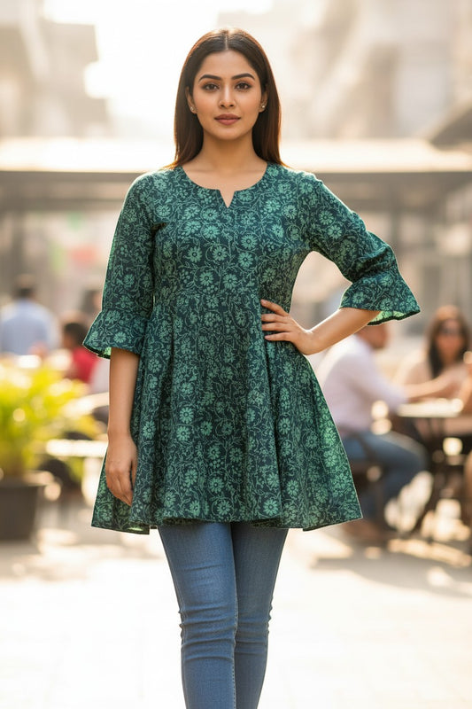 Naanu deep teal green cotton kurti with light teal floral vine jaal print, V-neck, 3/4 flared sleeves, and A-line silhouette.