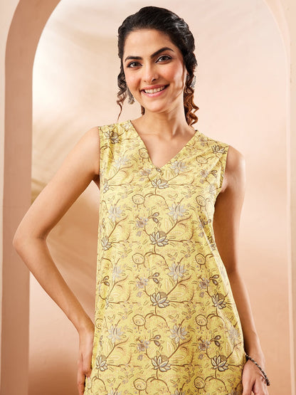 Naanu yellow sleeveless V-neck kurta with lotus and floral print, paired with matching palazzo pants.