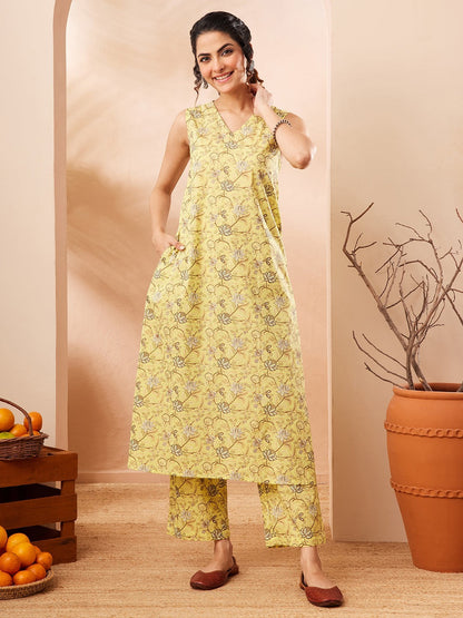Naanu yellow sleeveless A-line kurta with lotus print and matching palazzo pants, V-neck, side pockets.